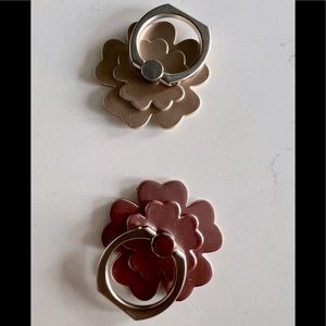 Two brand new flower ring stands for phone.